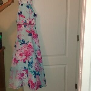 Beautiful girl long formal dress with beaded belt